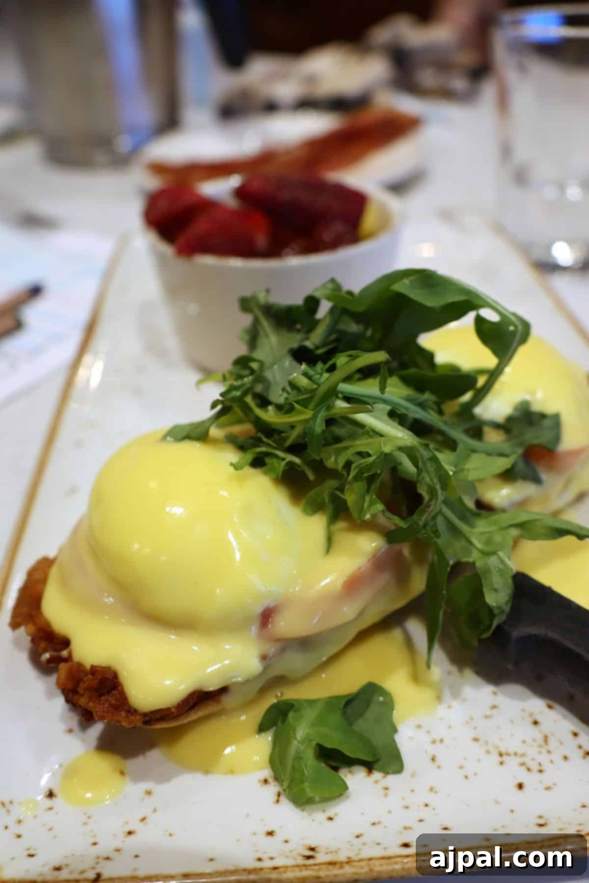Eggs Benedict with roasted potatoes breakfast