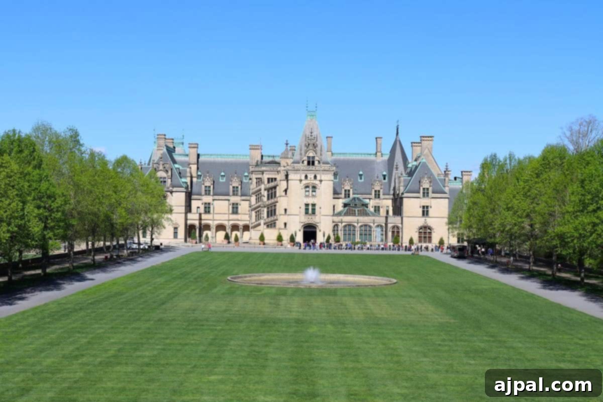 Exterior view of the Biltmore House with manicured lawn