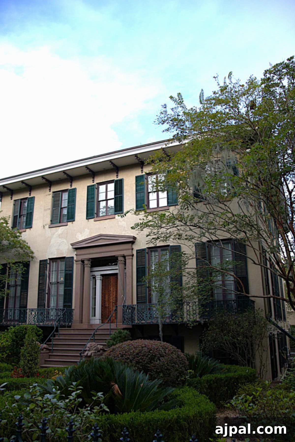 Historic house in Savannah with green shutters