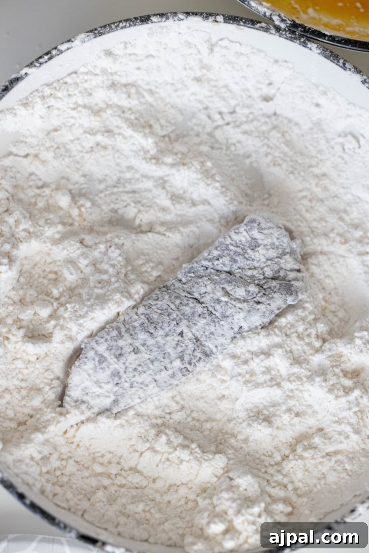 Steak strip coated in flour