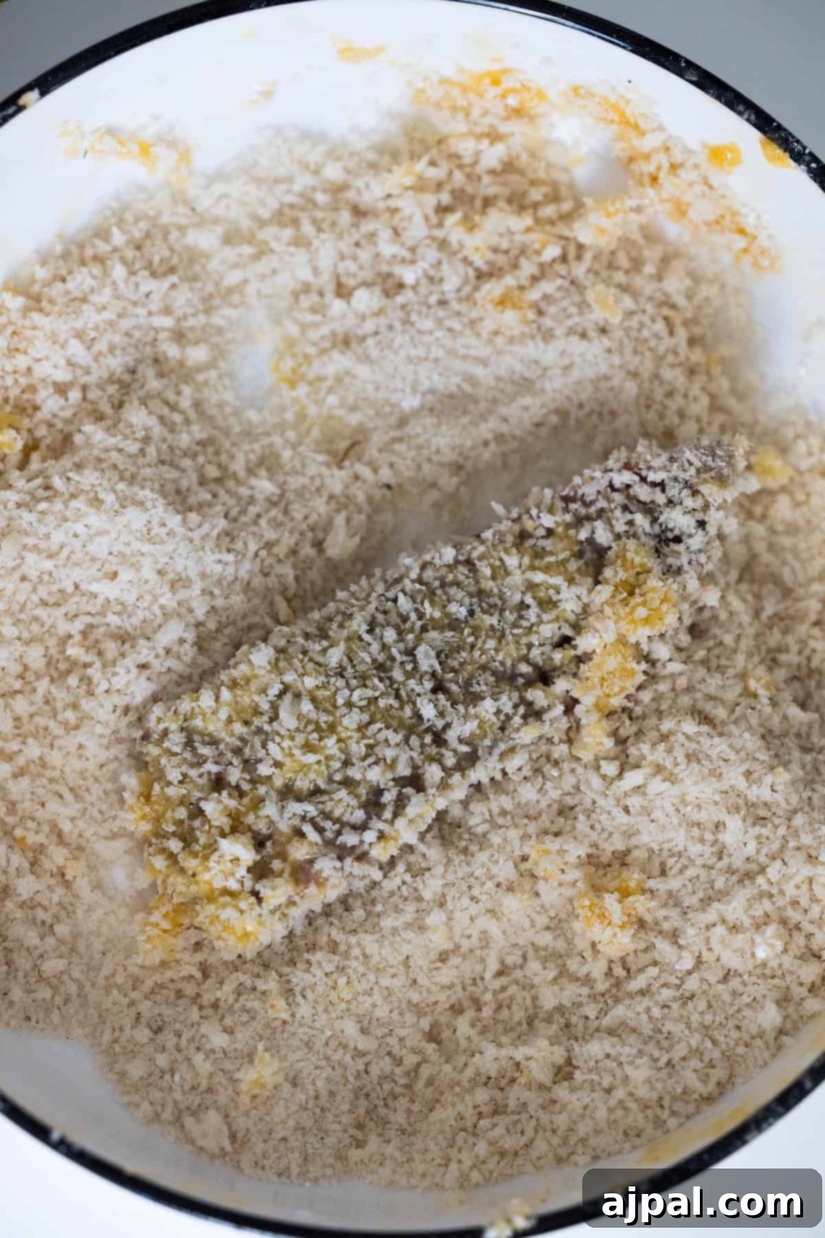Steak strip covered in panko breadcrumbs
