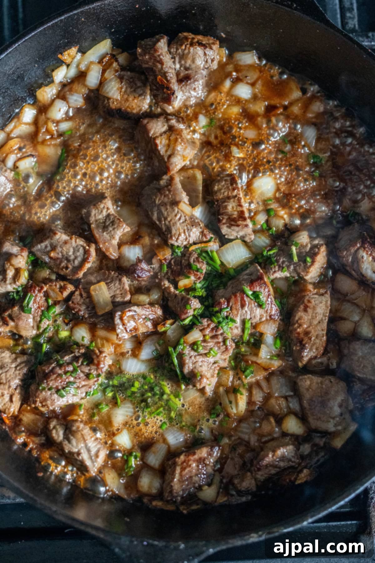 Sirloin Steak Bites 9 Sirloin Steak Tips with Sauce in Skillet