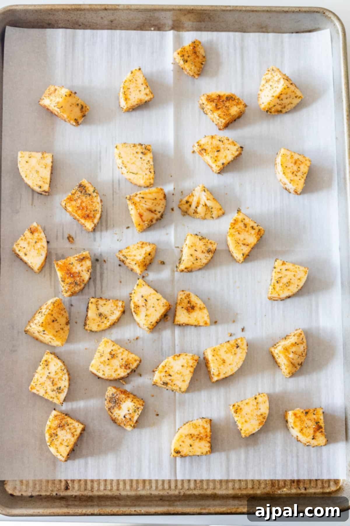Arranging polenta on baking sheet