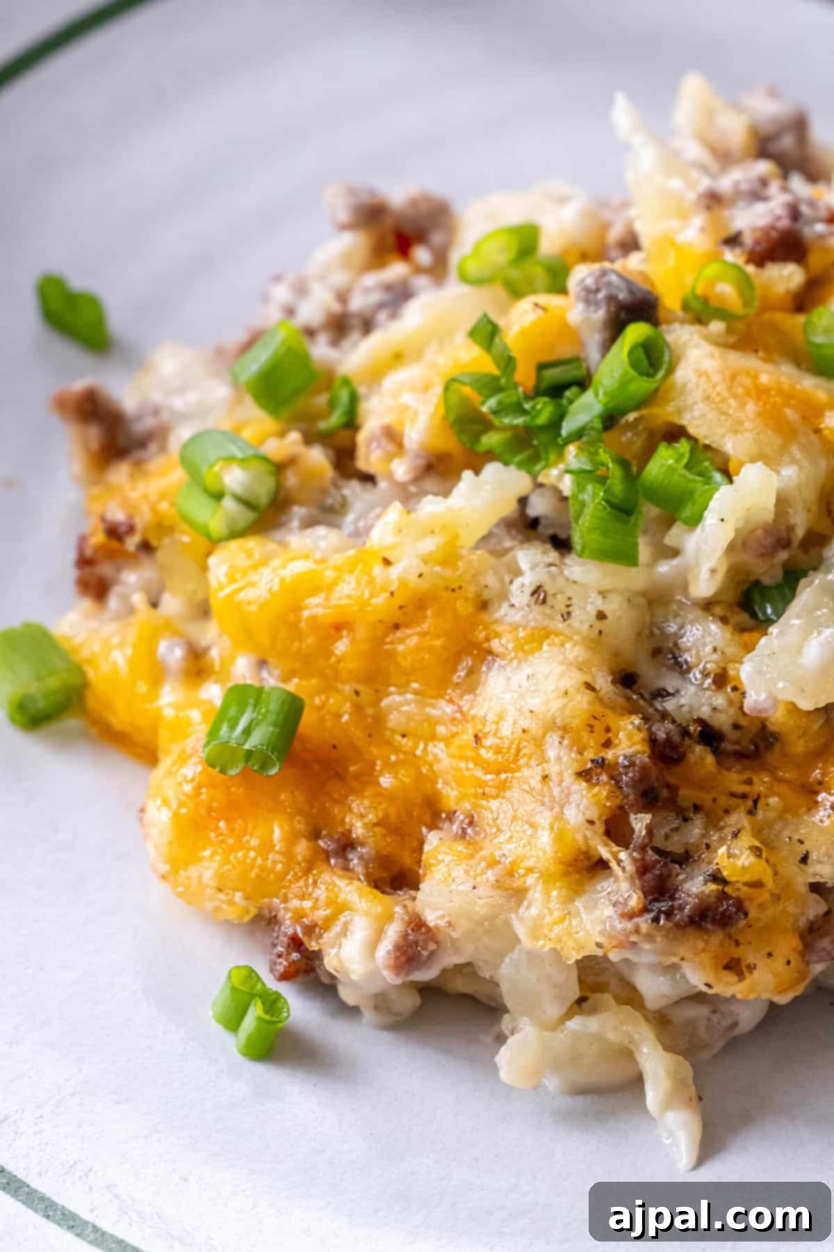 Cheesy Ground Beef and Potato Bake 5 Cheesy Ground Beef Casserole on a Plate
