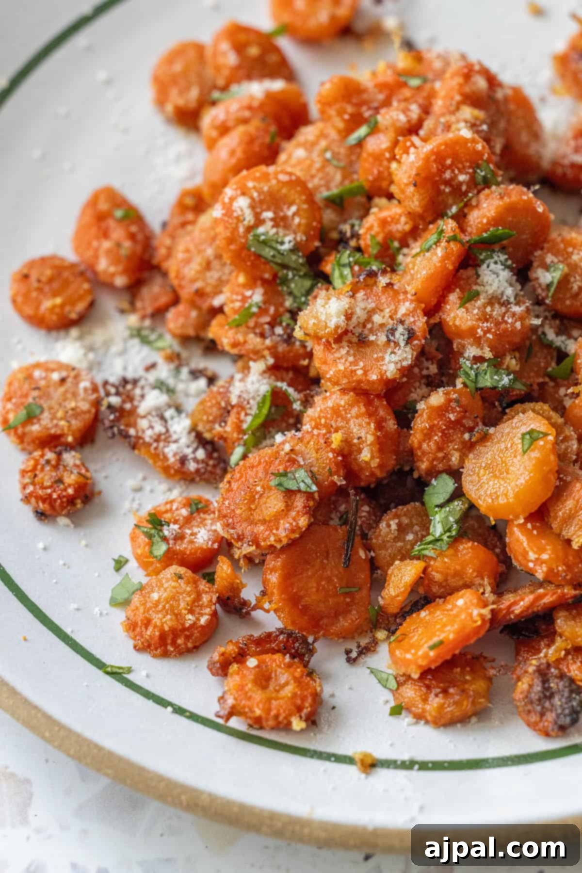 Plate of Garlic Parmesan Roasted Carrot slices