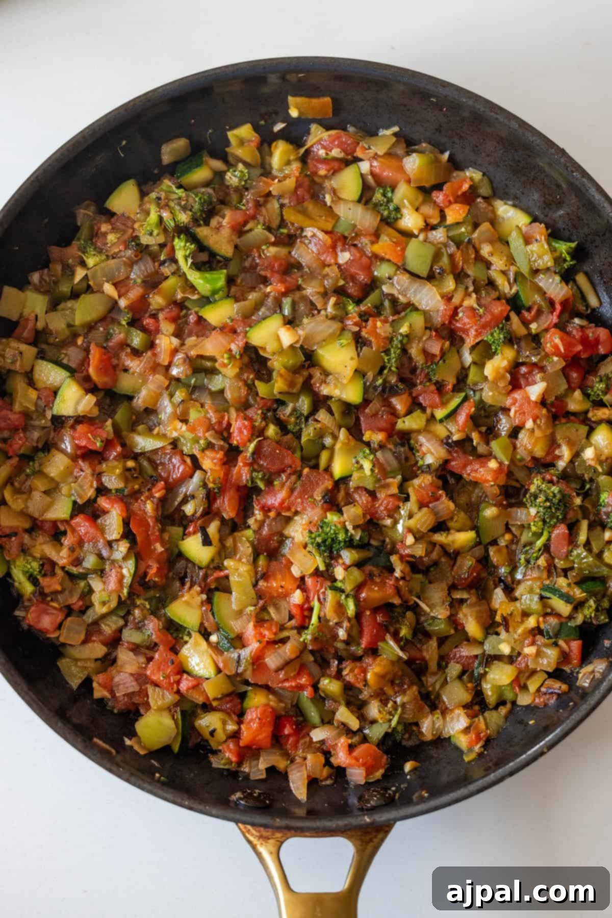 Sautéed vegetables in a skillet