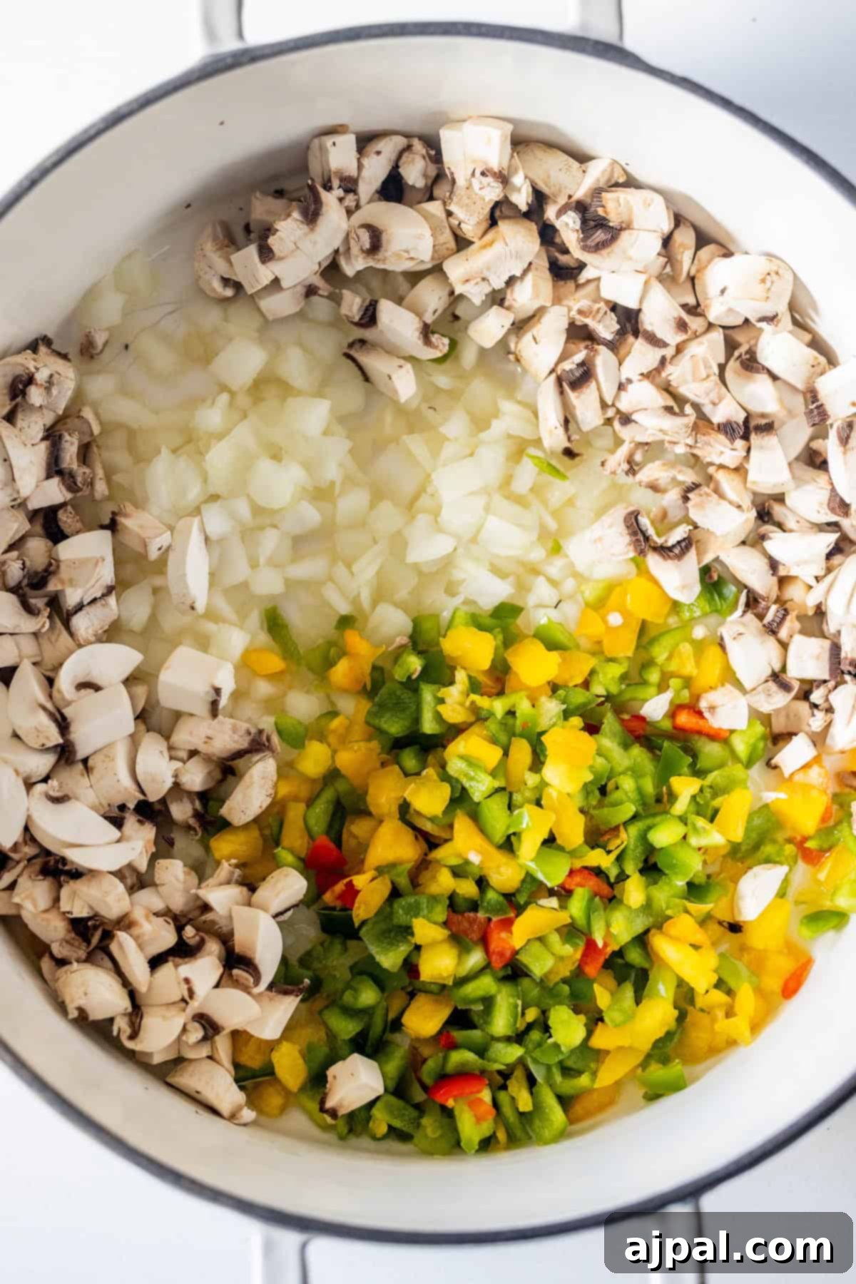 Vegan Crispy Potato Soup 6 Chopped vegetables inside a pot.