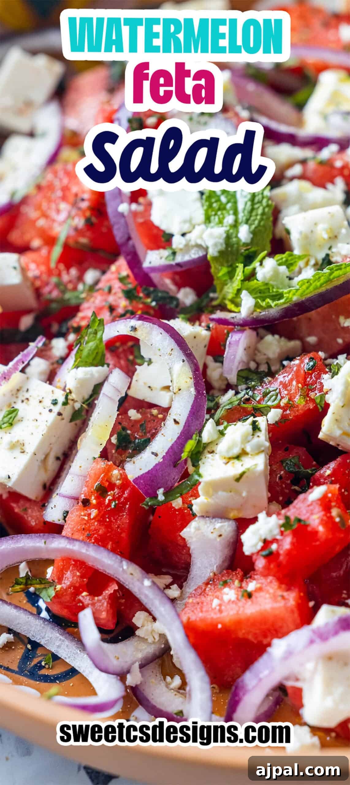 Close-up of watermelon feta salad with red onions, refreshing mint, basil, and herbs, featuring text labeling the dish and a website link at the bottom.
