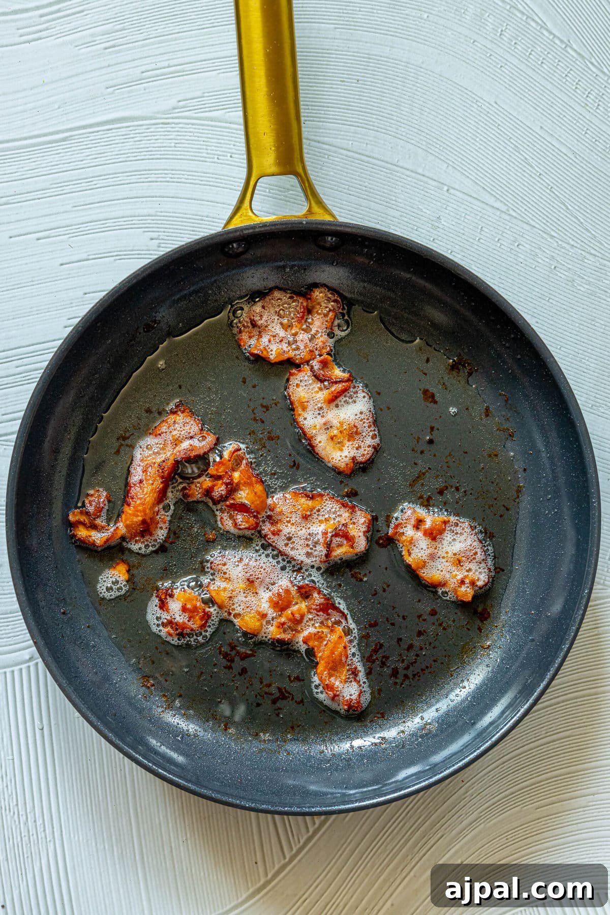 Authentic Mexican Charro Beans Recipe with Bacon and Chiles 5 Pan-fried bacon.