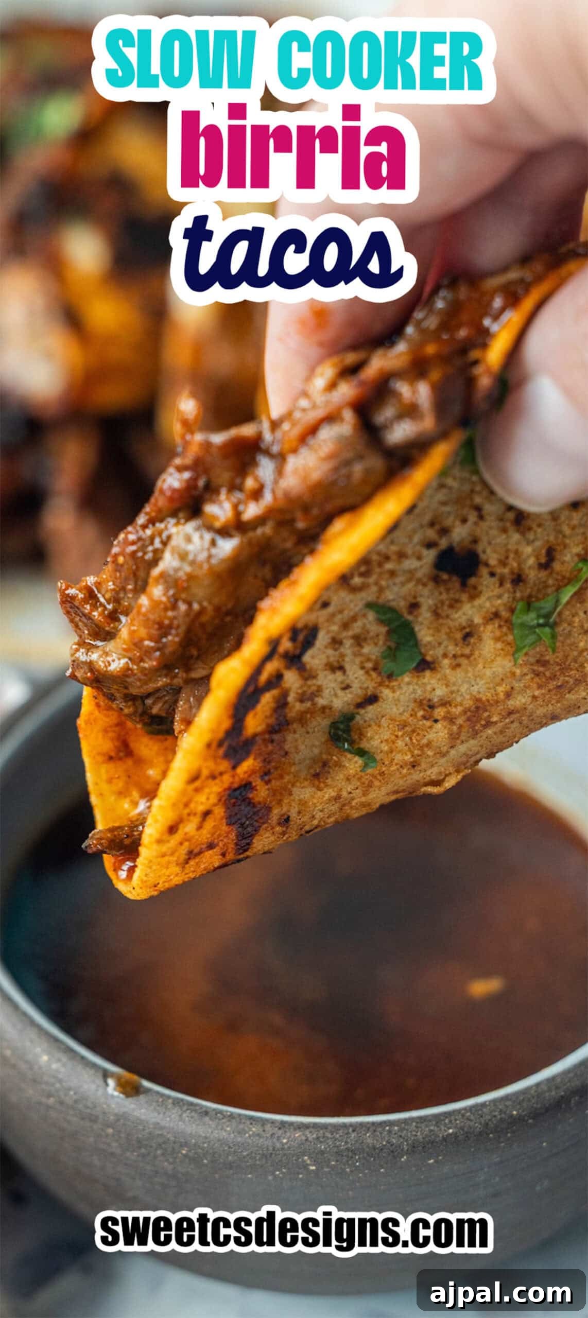 Authentic Birria Tacos Recipe: Juicy Mexican Beef Tacos 18 A hand dips a flavorful Birria Taco into a bowl of consommé.