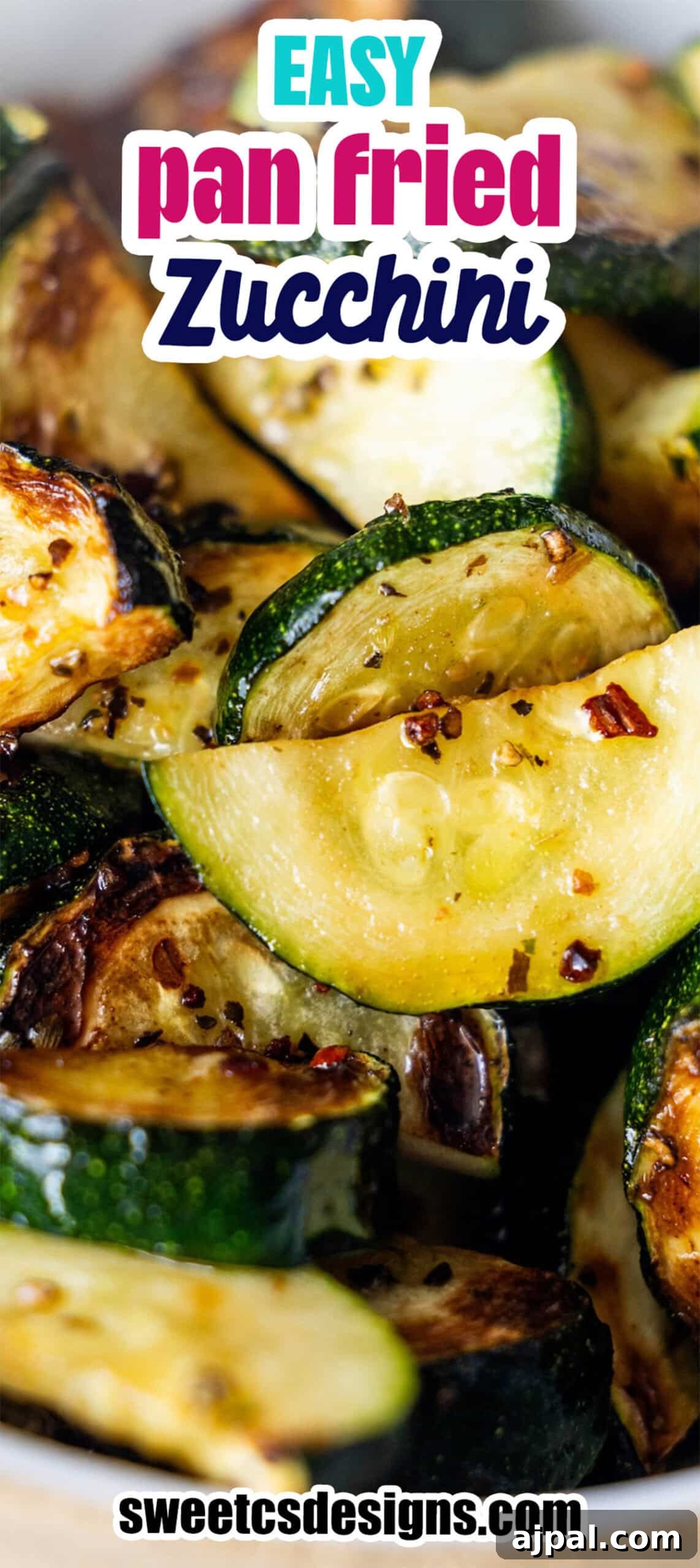 Sliced zucchini, pan-fried with herbs and spices for a delicious pan fried vegetables dish, served in a bowl. Text overlay reads “Easy Pan Fried Zucchini” with a website link at the bottom.